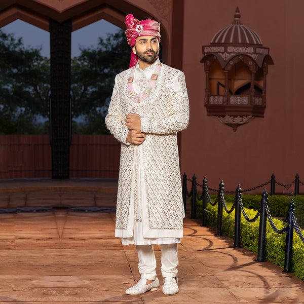 Regal White Sherwani with Lavish Golden Embroidery