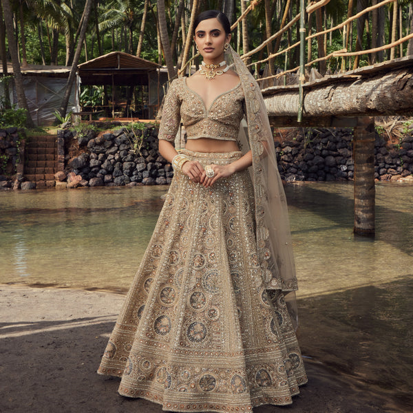 Coveted Matte Gold Lehenga With Self Colour Work