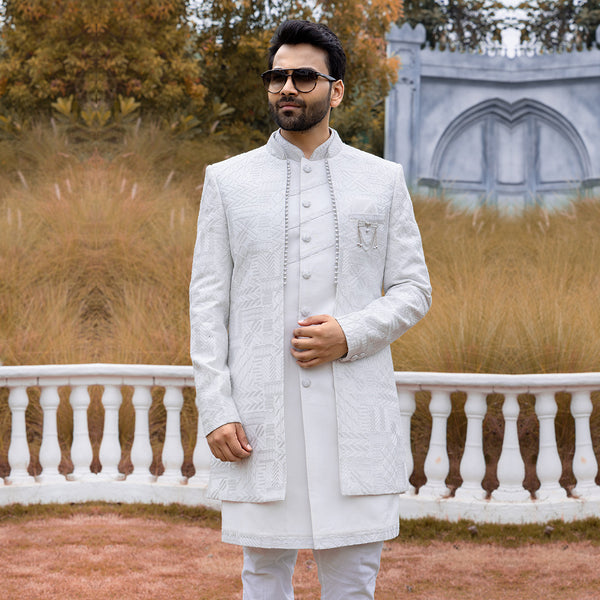 Elegant White Jodhpuri with Modern Cuts