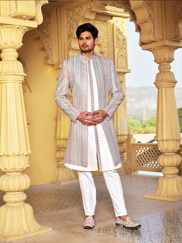 Regal White-Hued Sherwani Set with a Striped Coat