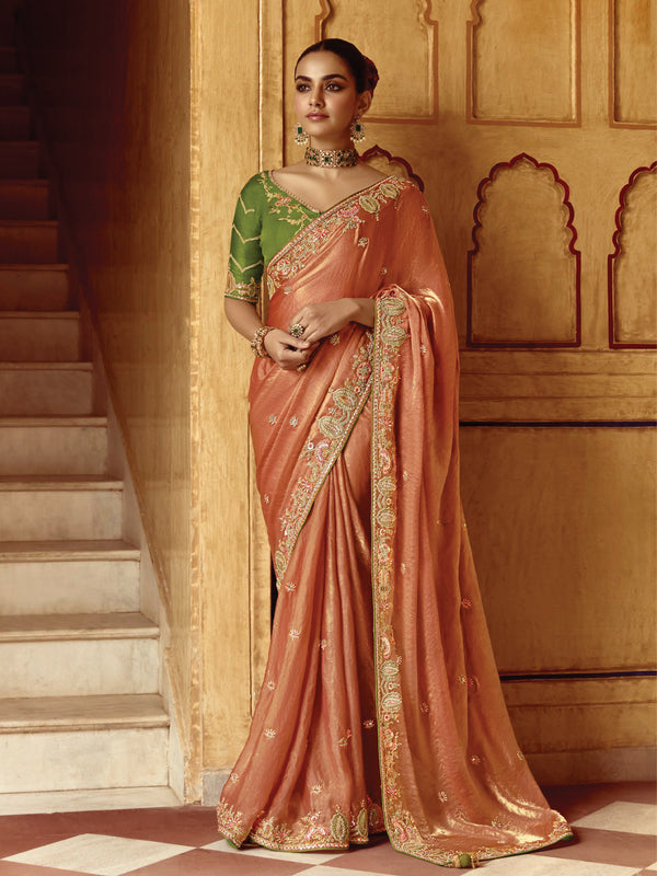 Lustrous Burnished Peach Silk Saree with Antique Zari Embroidery