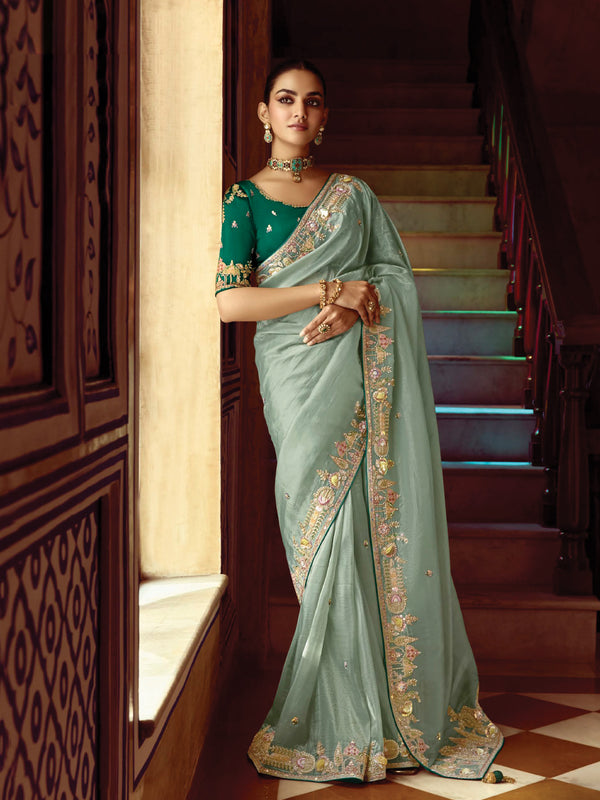 Celestial Sage Green Silk Saree with Opulent Zari Embroidery