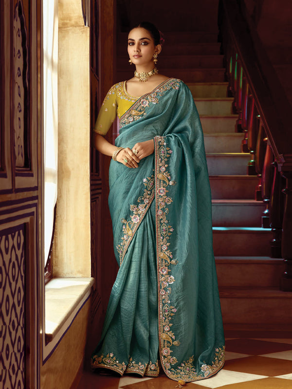 Serene Teal Green Saree with Mustard Blouse and Ornate Floral Embroidery