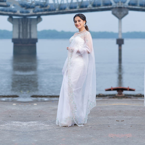Elegant White Saree with Exquisite Net Embellishments