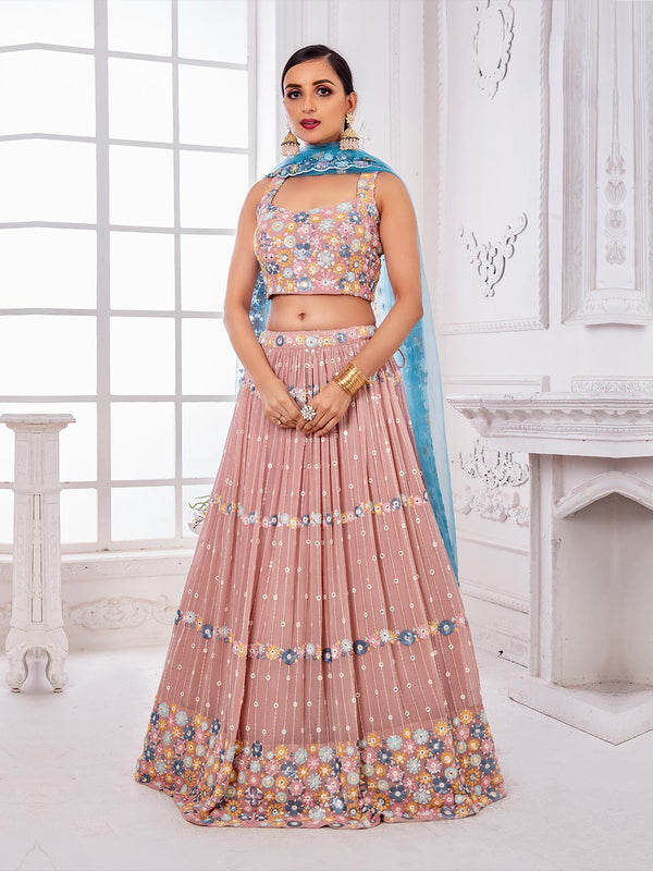 Mauve Pink Fabulous Lehenga Choli in Floral Detailing Paired with Blue Drape