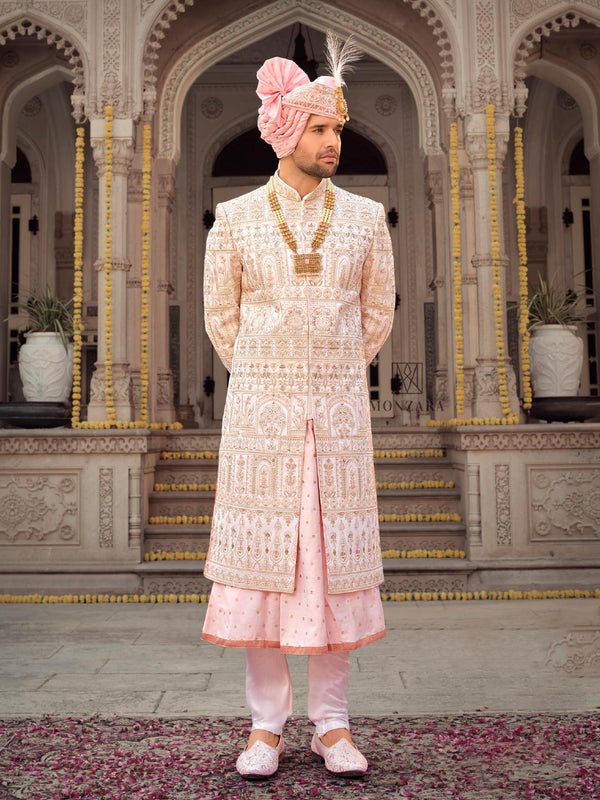 Magnificient Pastel Pink Sherwani set with Intricate Threadwork
