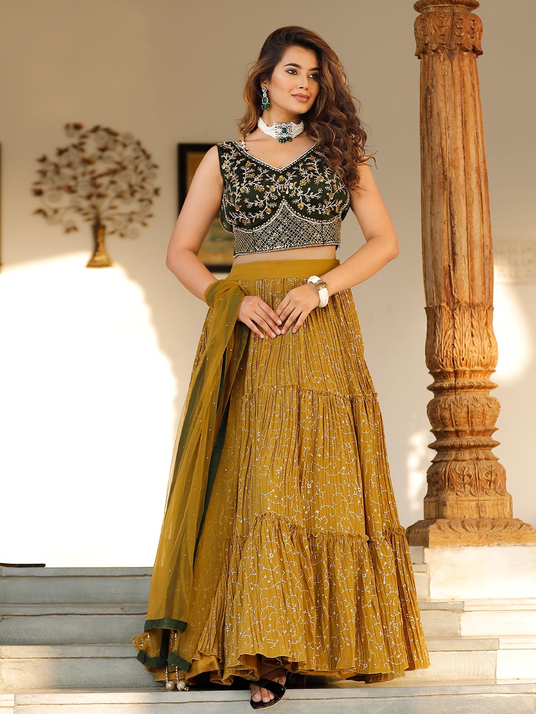 Breathtaking Dark Green & Mustard Yellow Lehenga In Georgette Enriched With Heavy Work
