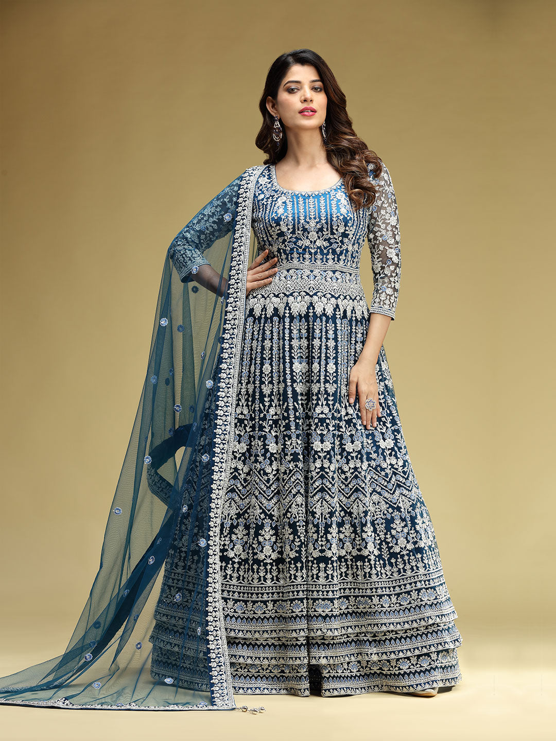 Splendid Stone Work And Embroidered Blue Gown Paired With Net Dupatta Suvidha Fashion